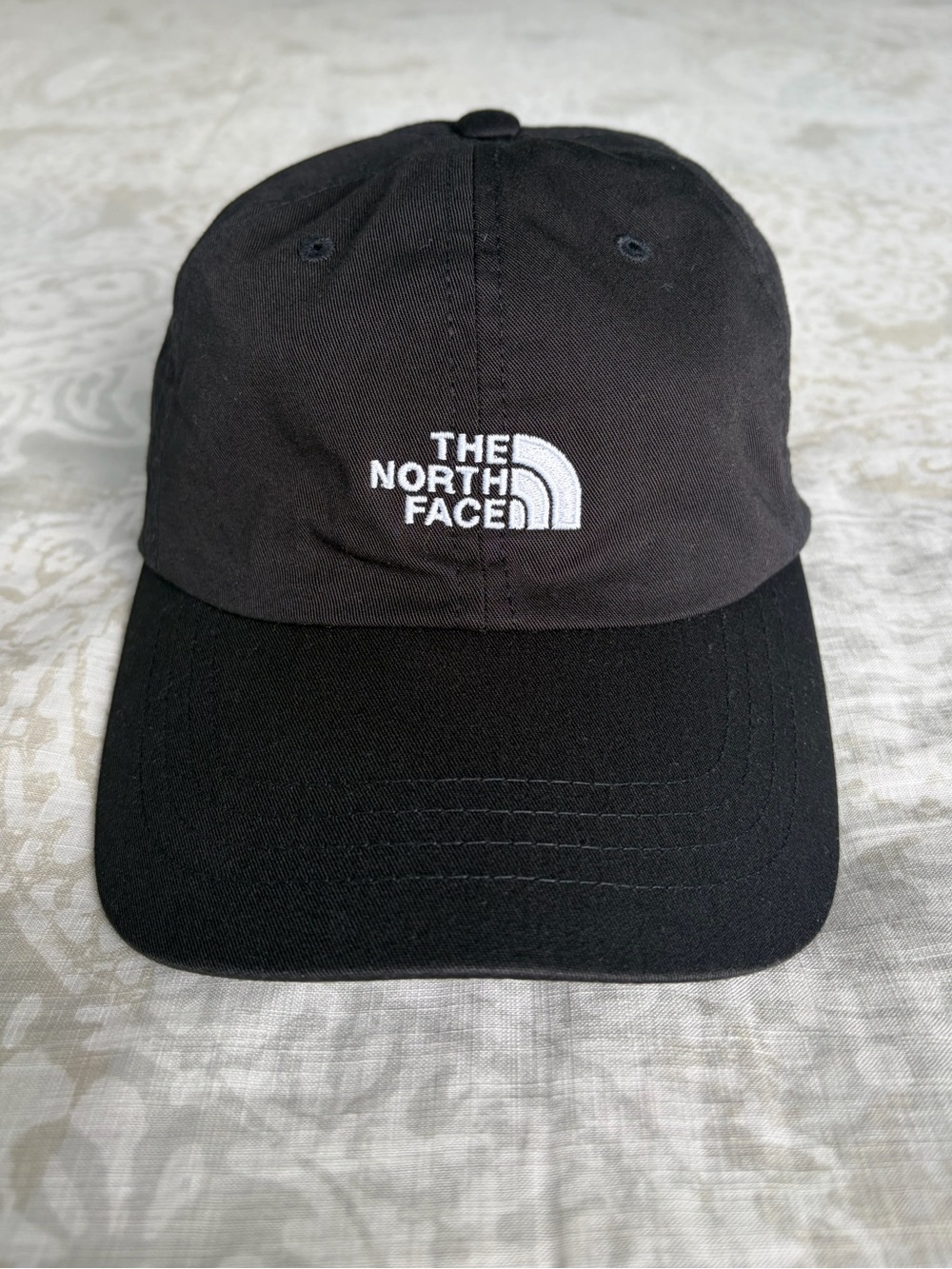 The North Face Basic Black Hat with White Logo